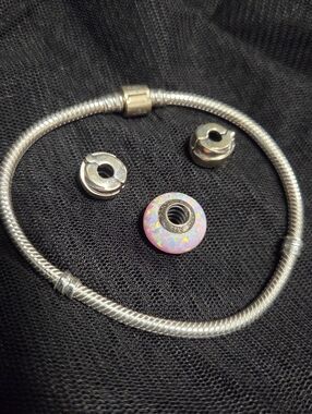 Pandora Bracelet With Two Clips And One Pink Opal Bead